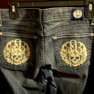 Rear find rock Republic with skulls on the back pocket size 28 waist